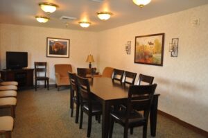 Room with dining table and chairs