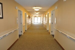 Interior hallway of a building with open doors