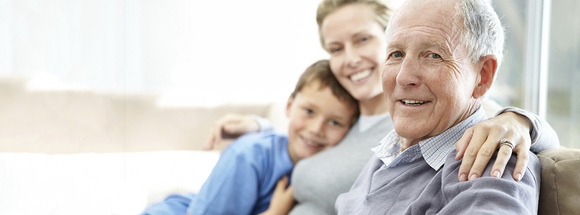 Adult child with senior father and son