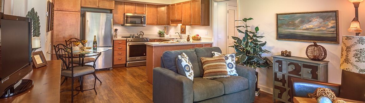 Kitchen and living room of apartment at Covenant Living of Mount Miguel