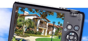 Camera with exterior image of apartment homes at Covenant Living of Mount Miguel